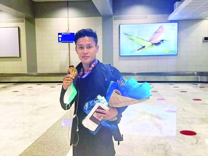 Arnel Mandal of Iloilo City won gold for the Philippine Wushu/Sanda team in the 31st SEA Games in Hanoi, Vietnam. PHOTO COURTESY OF PTV SPORTS