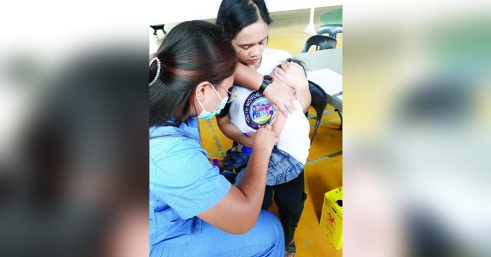 Nearly 2,000 Aklanon children get vax for measles, oral polio