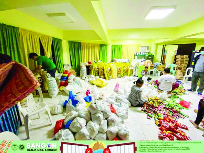 The Social Welfare Department and the Disaster Risk Reduction and Management offices of Antique ready family food packs in preparation for the possible effects of Super Typhoon “Mawar”. PROVINCE OF ANTIQUE FACEBOOK PAGE