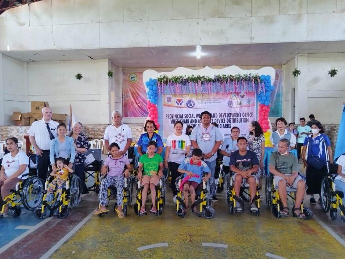 Persons with disability from Banate, Iloilo received wheelchairs from the Provincial Social Welfare and Development Office and its partner, Latter Day Saint Charities Philippines, on May 16. RARA GANZON PHOTO