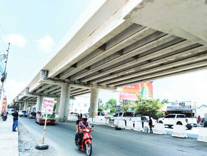 Repairing the flyover in Barangay Ungka II, Pavia, Iloilo will cost at least P250 million. The repair will also take nearly a year to complete, according to the third-party consulting firm tapped to conduct a geotechnical investigation on the defective structure. PN PHOTO