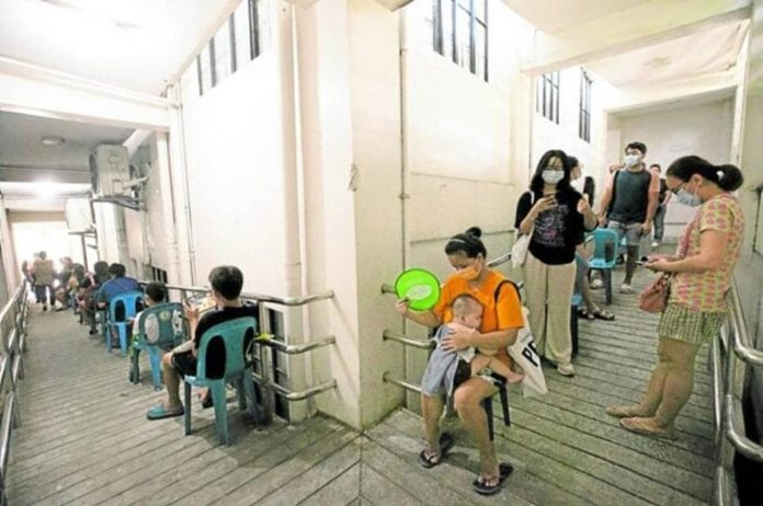 PROTECTED VS CORONAVIRUS. Residents of Pasig City line up for COVID-19 vaccination at Rosario Super Health Center in Pasig City. Photo by LYN RILLON / Philippine Daily Inquirer