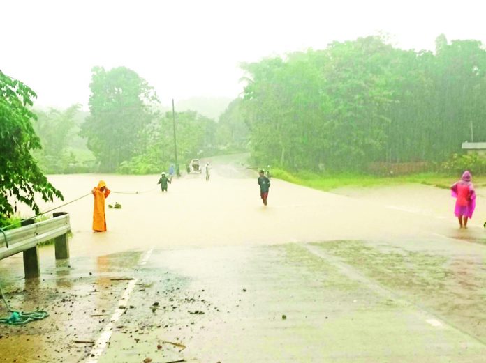 Flooding hits barangays Mulapula and Mambiranan Pequeño in Passi City, Iloilo on Wednesday afternoon. CIU LGU PASSI FB PHOTO