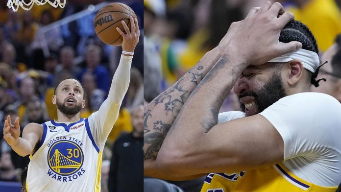 The Golden State Warriors’ Stephen Curry (left) rallies teammates to win against the Los Angeles Lakers whose Anthony Davis (right) had to go to the locker room late after appearing to take a hit in the head. AP