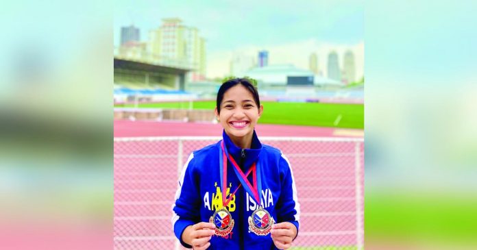 Trixie Lofranco ruled the women’s individual anyo non-traditional open weapon category in the 32nd Southeast Asian Games on Tuesday in Phnom Penh, Cambodia. CONTRIBUTED PHOTO