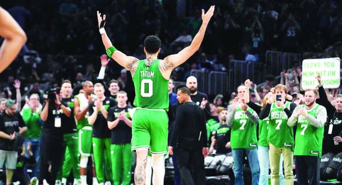 “It’s the best time of the year,” says Boston Celtics’ Jayson Tatum said. “As a competitor, I love the opportunity.” He is shown here celebrating after the Celtics won Game 7 against the Philadelphia 76ers. AP