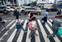 The quality of jobs in the Philippines has improved as seen in the reduction of underemployment in March this year. Photo shows office workers walking at a crossing in Makati City. MARK DEMAYO/ABS-CBN NEWS FILE PHOTO