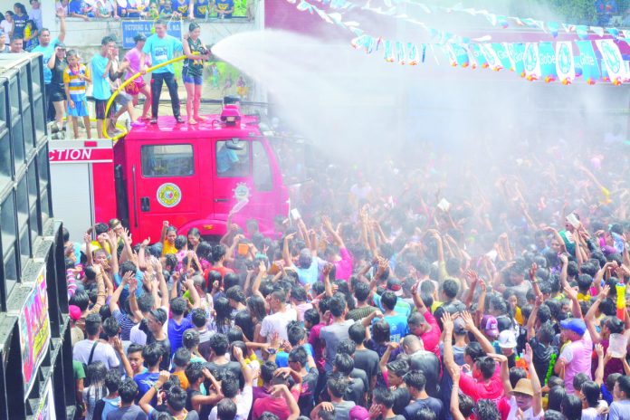 The Coast Guard District Western Visayas personnel are on their toes as thousands are expected to celebrate the feast day of St. John the Baptist on Saturday, June 24. Photo shows residents of Sara, Iloilo on the streets for the Sulay Basya Festival 2017, their own version of the traditional “San Juan” feast. PN FILE PHOTO