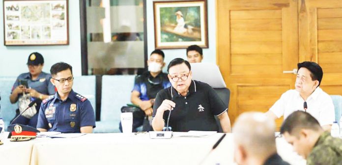 ON TOP OF THE SITUATION. Despite the challenges to his leadership which include court charges, Iloilo City’s Mayor Jerry P. Treñas remains steadfast in his commitment and obligations as local chief executive. Photo shows him presiding the Iloilo City Peace and Order Council and Anti-Drug Abuse Council meeting last week. Various programs and projects related to peace and order, illegal drugs, and insurgency were discussed.