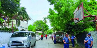 Policemen recover this passenger van abandoned in Barangay Luna, Jaro, Iloilo City. Its driver lied about getting carnapped on Tuesday, June 27, for failing to remit his earnings to the van owner. AJ PALCULLO/PN