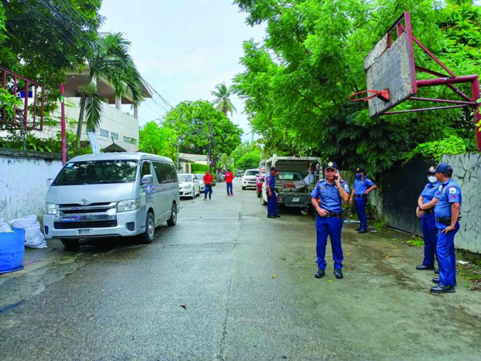 Policemen recover this passenger van abandoned in Barangay Luna, Jaro, Iloilo City. Its driver lied about getting carnapped on Tuesday, June 27, for failing to remit his earnings to the van owner. AJ PALCULLO/PN