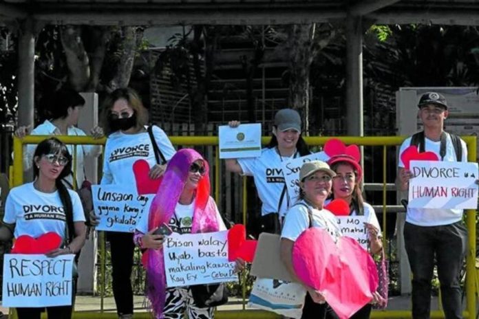 This photo taken on Feb. 14, 2023 shows pro-divorce protesters taking part in a demonstration on Valentine’s Day in front of the Senate Building in Pasay, Metro Manila. AFP