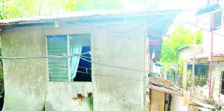 The house (right) of Melba Jeminillo (left) and her family in Barangay Bakhaw, Mandurriao, Iloilo City was destroyed by 10 unidentified armed men on Tuesday night, June 20. Barangay Captain Joel Alvarado said the armed men were allegedly looking for someone else and may have attacked the wrong house. AJ PALCULLO/PN