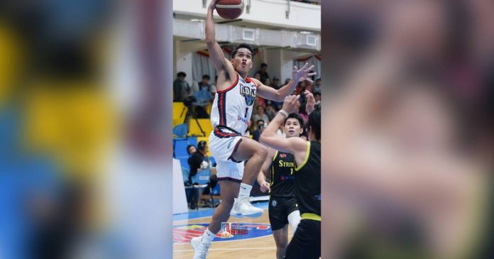 Iloilo United Royals-Cocolife’s Tony Ynot attacks a Bacoor City Strikers’ defender for a layup. MPBL PHOTO