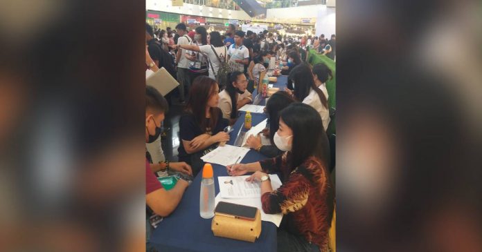 Job seekers queued to apply for work at the Department of Labor and Employment Kalayaan Job Fair held at SM City Bacolod on Monday, June 12. Seventy-nine applicants were hired on the spot. DOLE-6 FACEBOOK PAGE