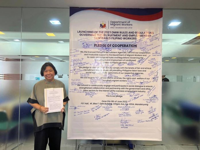 Secretary Susan Ople of the Department of Migrant Workers announces the simplified rules for the recruitment and employment of land-based overseas Filipino workers. DMW PHOTO