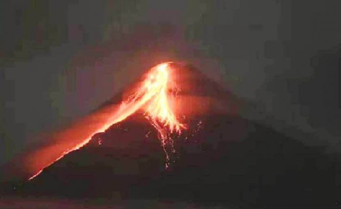 Mount Mayon expels lava in Albay. More than 14,000 residents have been staying in evacuation centers, according to the National Disaster Risk Reduction and Management Council. AFP/GETTY IMAGES