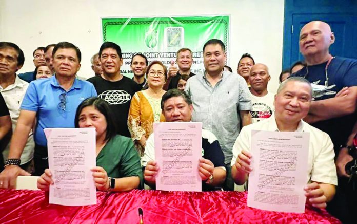 Central Negros Electric Cooperative president Jojit Yap and acting general manager Arnel Lapore and Primelectric Holdings president and chief executive officer Roel Castro sign a joint venture agreement on Saturday, June 3.