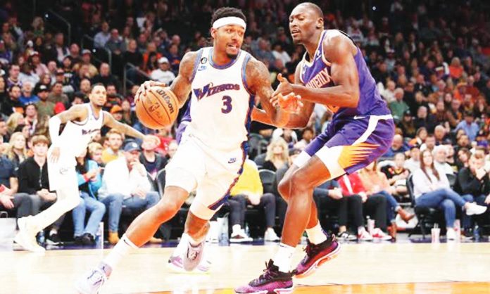 Bradley Beal and Bismack Biyombo are now teammates at the Phoenix Suns after the former was shipped out by Washington Wizards. GETTY IMAGES