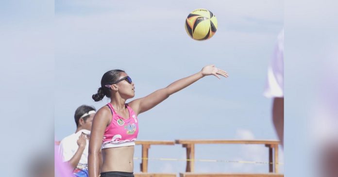 Negrense Honey Grace Cordero of Grass to Bone team prepares to serve during their 2023 BVR on Tour Sipalay City leg game. BVR PHOTO