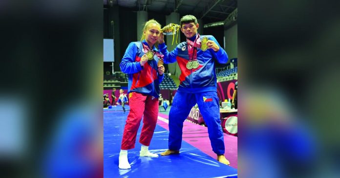 Maria Aisa Ratcliff and Fierre Afan display the medals they won in the 2023 United World Wrestling United World Grappling Asian Championships. CONTRIBUTED PHOTO