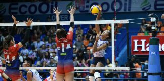 Negrense Bernadeth Pons of Creamline Cool Smashers goes for an attack against the defense of Quezon City Gerflor Defenders’ Jannine Navarro. PVL PHOTO