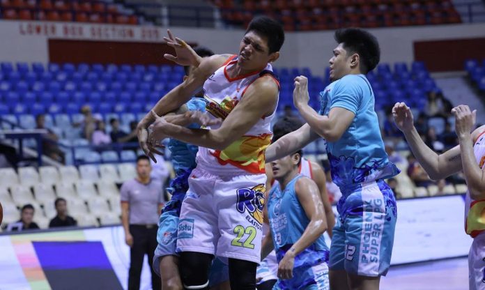 Rain or Shine Elasto Painters’ Jhonard Clarito loses the ball after being bothered by the defense of Phoenix Super LPG Fuel Masters. PBA PHOTO