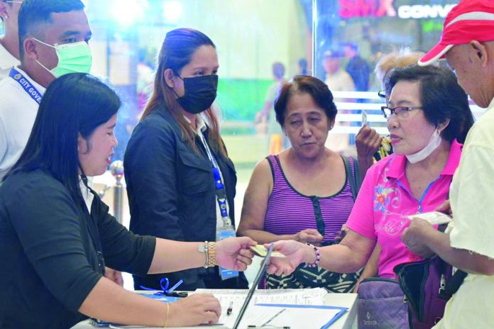 City residents avail themselves of government services at the Bacolod Express Services Office (BESO) at SM City-Bacolod, which officially opened on Tuesday, July 4. BACOLOD PIO PHOTO