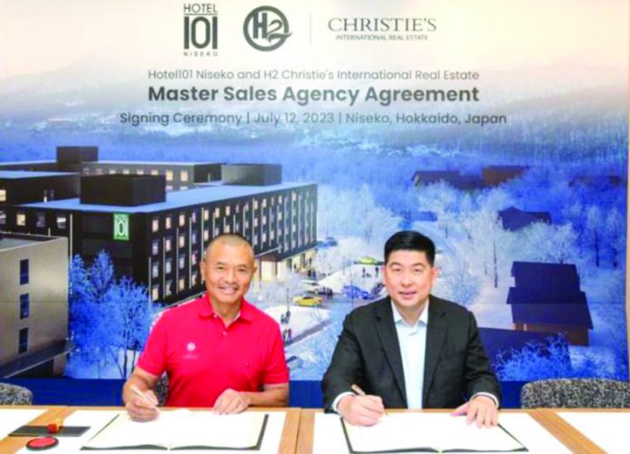 DoubleDragon chairman Edgar “Injap” Sia II (right) and H2 Christie’s International Real Estate co-chief executive officer Michael Chen (left) sign the Exclusive Master Sales Agency Agreement on Wednesday, July 12.