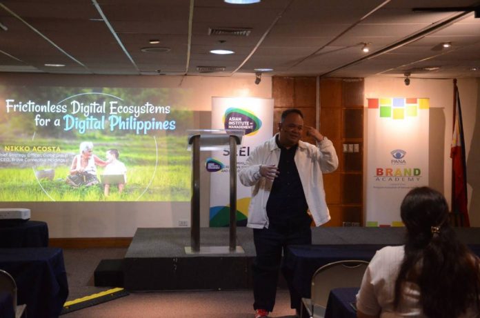 Nikko Acosta, Chief Strategy Officer of the Globe Group, speaks at a recent forum organized by the Philippine Association of National Advertisers (PANA) on maximizing digital ecosystems.