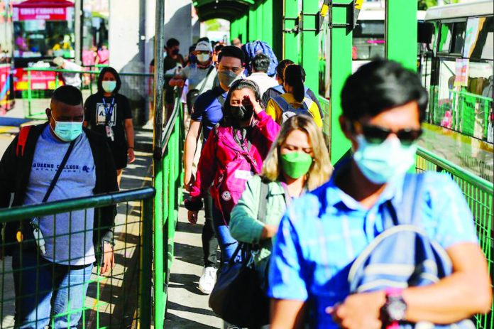 Commuters fall in line at the Monumento bus stop in Caloocan. The Philippines’ underemployment rate dipped to 11.7 percent in May from 12.9 percent in April this year. JONATHAN CELLONA/ABS-CBN NEWS PHOTO