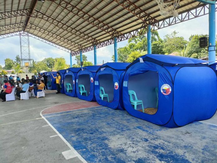 MODULAR TENTS. An evacuation center is one of the projects for the town of Pavia from the Department of Social Welfare and Development-Kapit-Bisig Laban sa Kahirapan-Comprehensive and Integrated Delivery of Social Services. Photo shows 20 sets of modular tents as Pavia local government's counterpart to the project. AJ PALCULLO/PN