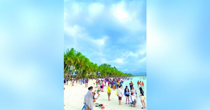 Tourists flock at the Boracay Island in January 2023. PHOTO COURTESY OF MALAY-BORACAY TOURISM OFFICE