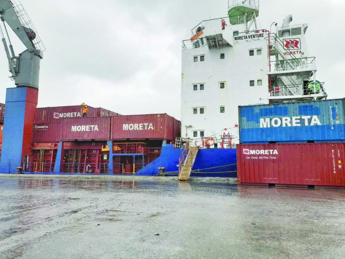 A 20-foot container van loaded with furniture fell off while being discharged from a cargo ship at the Iloilo Commercial Port Complex on Tuesday afternoon, July 25. PHILIPPINE COAST GUARD-ILOILO PHOTO