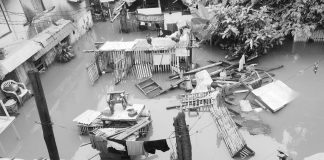 Seventy-three barangays in Iloilo City experienced flooding as of 3:45 p.m. on Thursday, July 27, according to the Iloilo City Emergency Operations Center. Photo shows a flooded area in Barangay Desamparados, Jaro district. AJ PALCULLO/PN