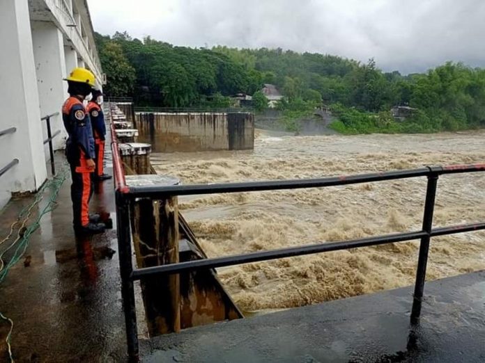 Personnel of the Bureau of Fire Protection monitor the Jalaur River Irrigation System Diversion Dam in Barangay Moroboro, Dingle, Iloilo in this file photo. BFP-DINGLE PHOTO