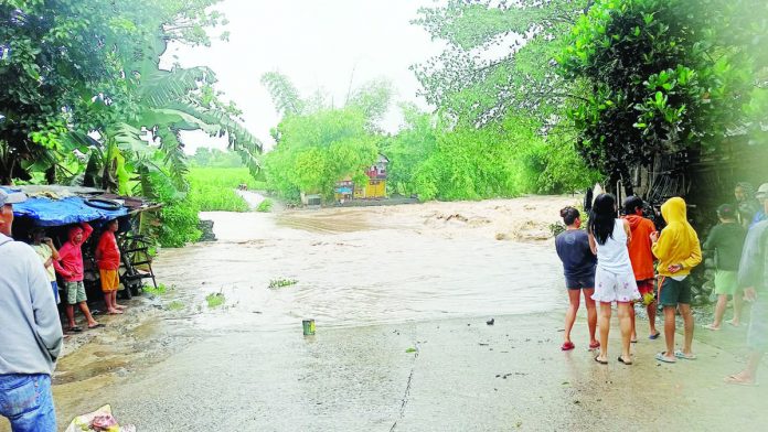 Heavy rains brought by the southwest monsoon enhanced by Typhoon “Egay” triggered floods and caused the river to overflow in Barangay RSB, La Carlota City, Negros Occidental. La Carlota City is among the local government units in the province that incurred agricultural damage. RSB SANGGUNIANG KABATAAN FB PHOTO