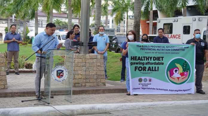 Provincial Health Officer I Dr. Wendel Tupas-Marcelo (second from left, in foreground), announces the provincial government's 2023 Nutrition Month celebration theme and activities at the provincial capitol ground on Monday, July 3. ILOILO PROVINCIAL HEALTH OFFICE FB PHOTO