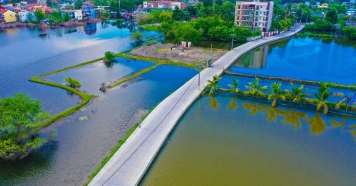 This 1.3-kilometer farm-to-market road in Barangay Lucao, Dagupan City eases the transport of aquaculture products from the village to the city's market. DPWH-ILOCOS PHOTO