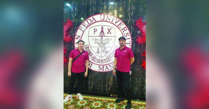 San Beda University Lady Red Spikers’ new head coach Edgar Barroga (right) and one of his assistant coaches, Ray Rosales (left). CONTRIBUTED PHOTO