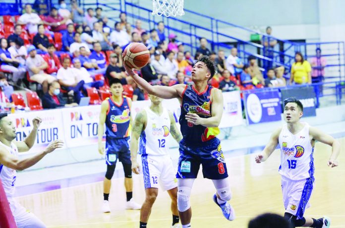 Rain or Shine Elasto Painters’ Anton Asistio scoops for a layup during their 2023 PBA on Tour game against TNT Tropang Giga. PBA PHOTO