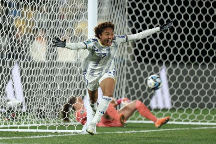 Sarina Bolden raises her hand in celebration after scoring a historic goal for the Philippines in the 2023 FIFA Women’s World Cup. FIFA PHOTO