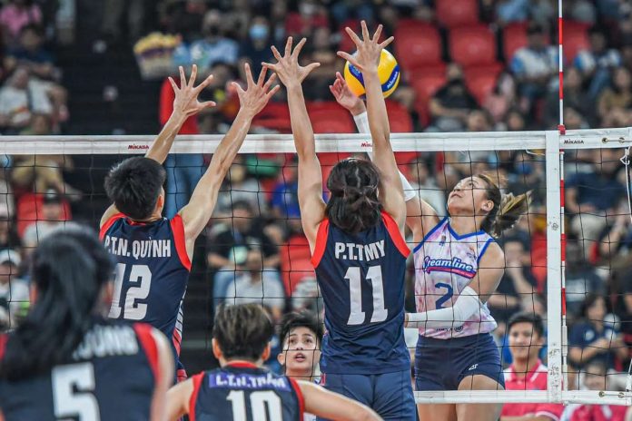 Creamline Cool Smashers’ Alyssa Valdez goes for an attack against the defense of two Kinh Bac-Bac Ninh players. PVL PHOTO