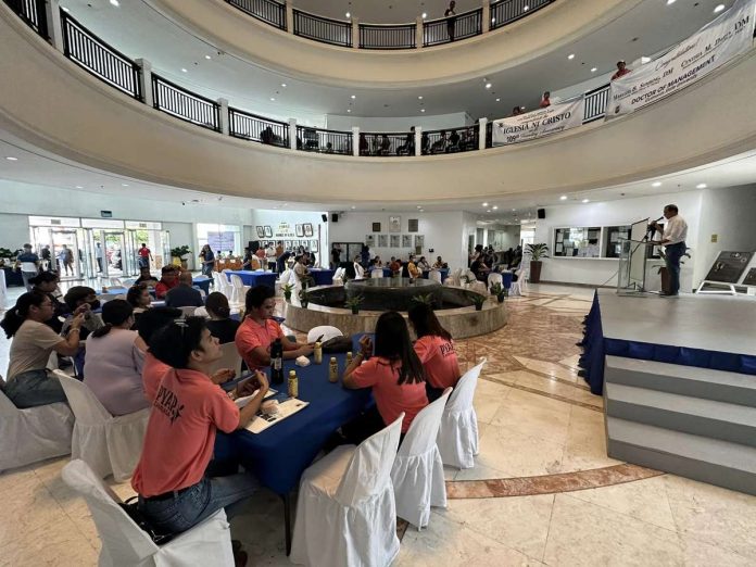 Provincial Administrator Raul Banias delivers a message on behalf of Gov. Arthur Defensor Jr. during the Basic Entrepreneurship Training and Startup 101 orientation on Aug. 9 at the Iloilo provincial capitol lobby. IME SORNITO/PN