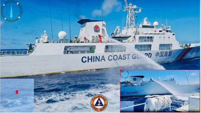 A Chinese Coast Guard ship sprays with water the Philippine Coast Guard’s vessels delivering food, water, fuel, and other supplies to military troops stationed on BRP Sierra Madre in Ayungin Shoal, West Philippine Sea. Photo courtesy of PCG