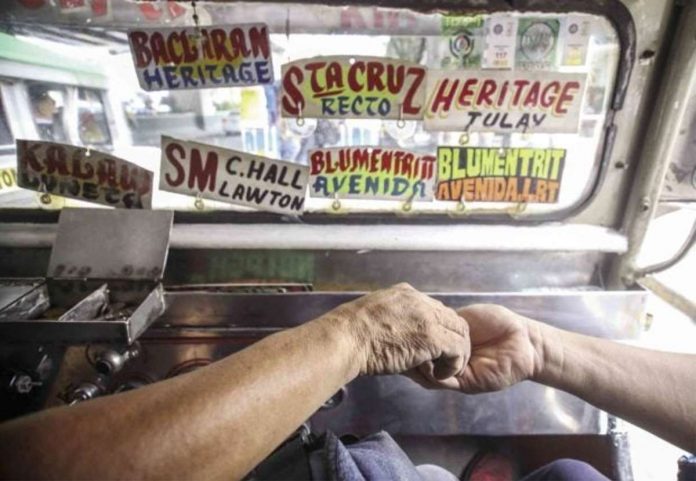 To alleviate the impact of rising fuel prices, transport groups earlier proposed a surge fee of P1 for the jeepney base fare and P2 to the city bus fare during rush hours, or between 4 a.m. to 8 a.m. and 5 p.m. to 8 p.m. INQUIRER FILE PHOTO