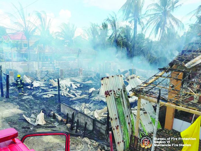 An afternoon blaze on Tuesday, Aug. 8, hit several commercial establishments in New Washington, Aklan, and left about P1 million in damages. NUMANCIA FIRE STATION PHOTO