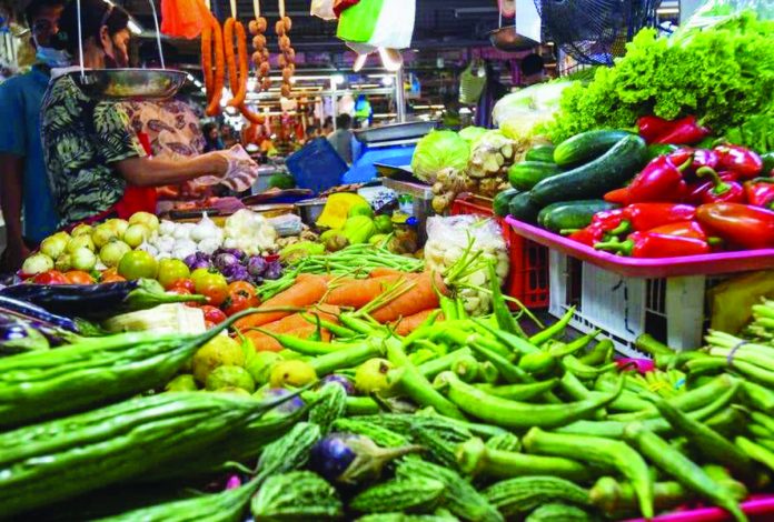 People buy various meat and produce at the Agora Public Market in San Juan City. MARIA TAN/ABS-CBN NEWS PHOTO