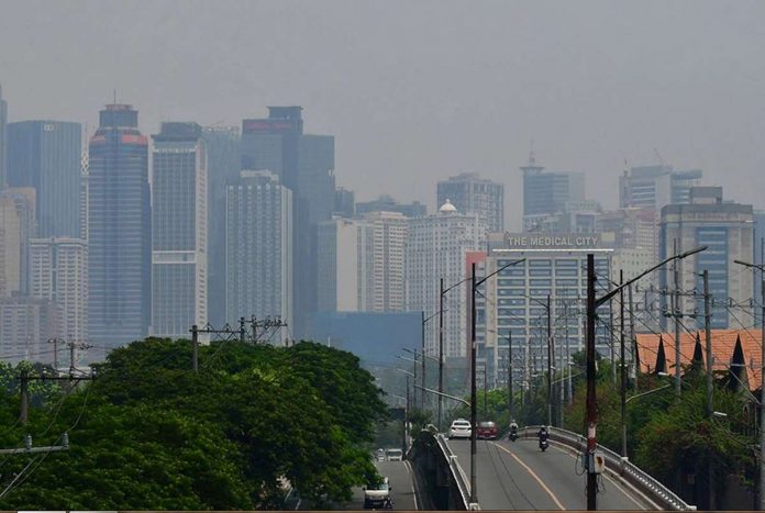 Manufacturing receives the largest amount of approved investment amounting to P35.07 billion in the second quarter of 2023. File photo shows the Metro Manila skyline covered with smog as seen from Pasig City. MARK DEMAYO/ABS-CBN NEWS PHOTO