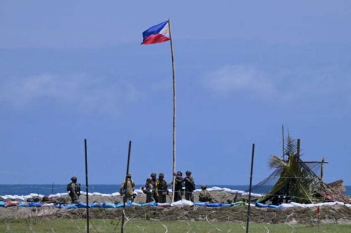 Filipino and Australian soldiers participate in a combat exercise in Tarumpitao Airfield in Rizal, Palawan, on Monday as a part of Exercise “Alon” between the Armed Forces of the Philippines and the Australian Defence Force. AFP